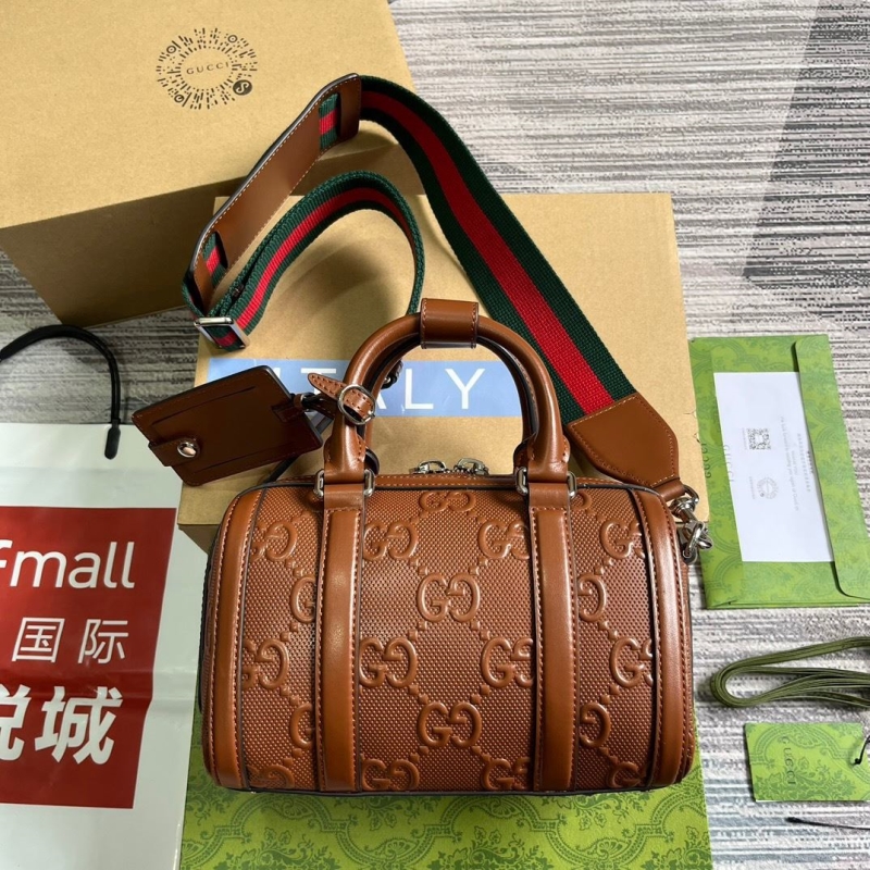 G*u*i top handle bags